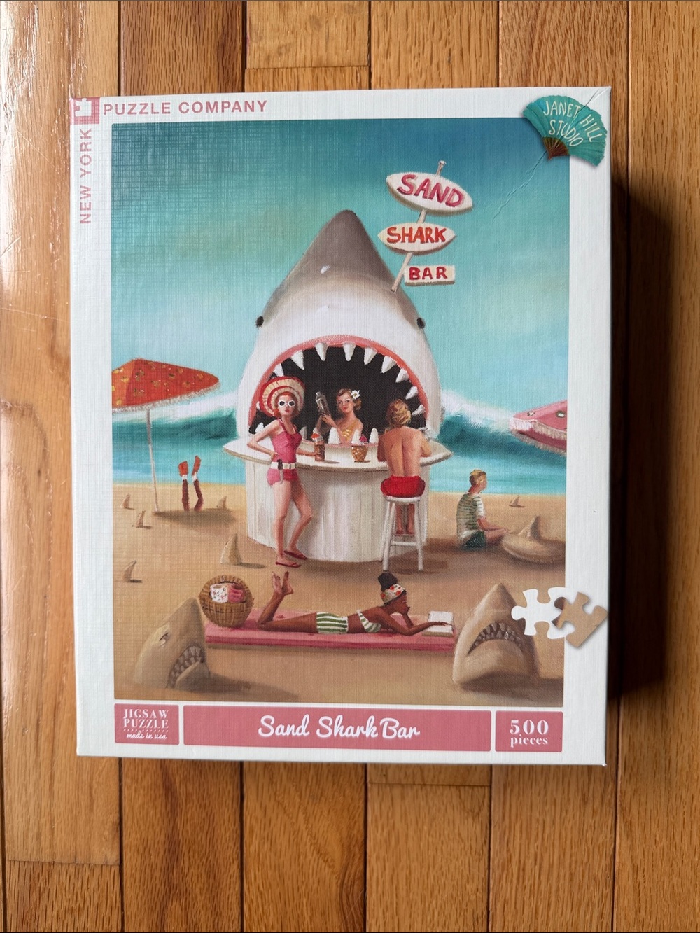 New York Puzzle Company Sand Shark Bar 500 pc Puzzle by artist Janet Hill